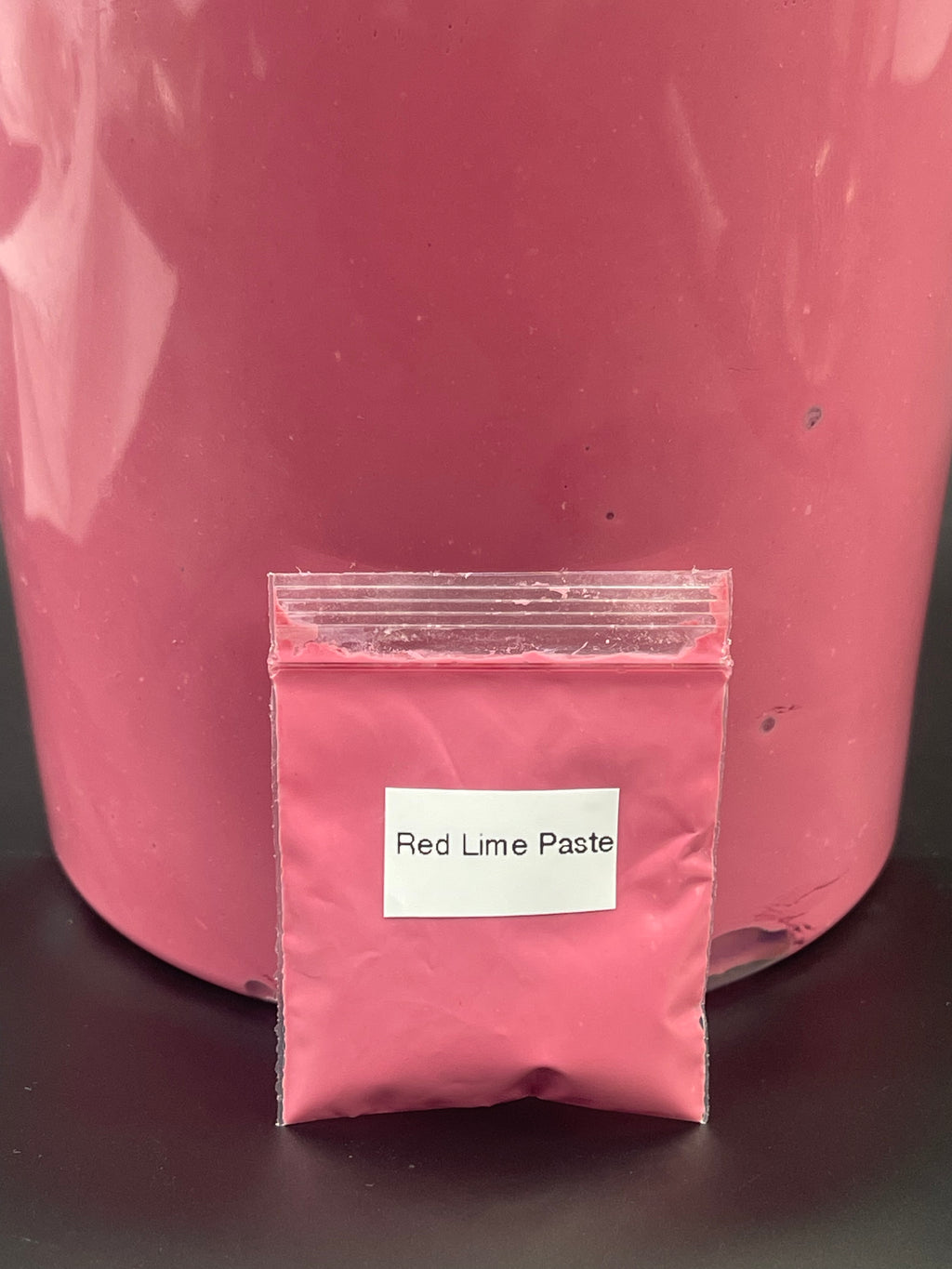 Small baggie of approximately 5cc of red lime paste